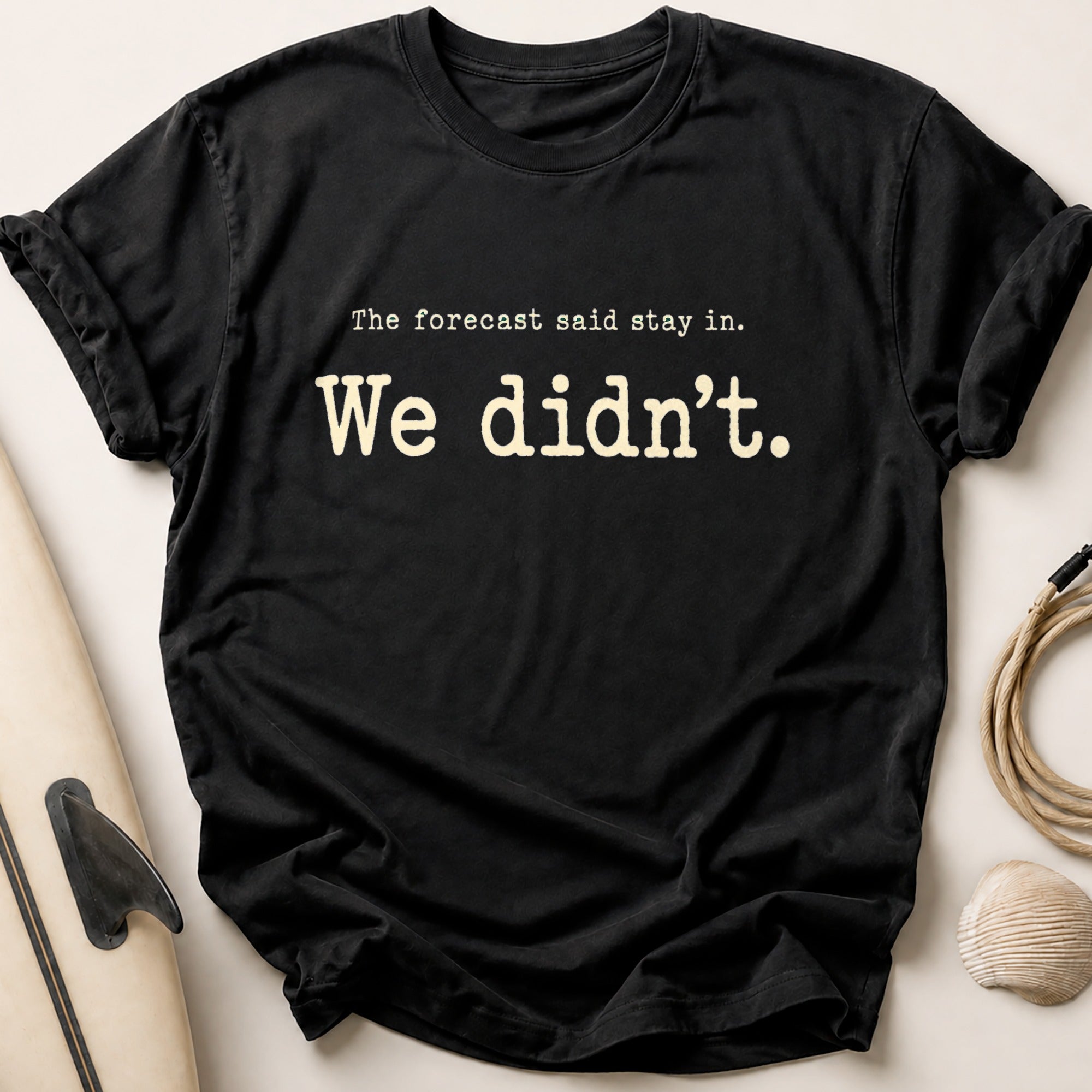 The forecast said stay in. Tee - Black